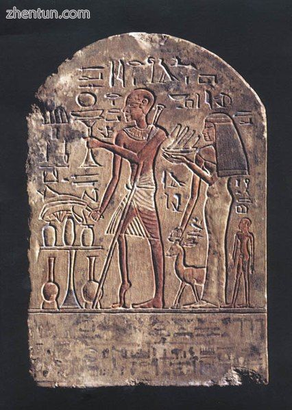 An Egyptian stele thought to represent a polio victim, 18th Dynasty (1403–1365 BC).jpg