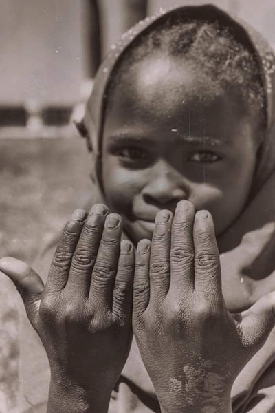 Hard hands of a young girl in Algeria.