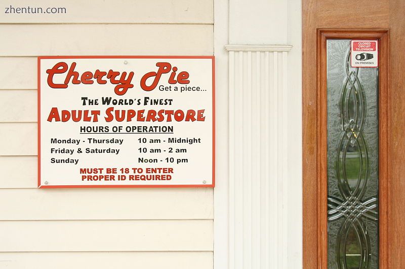 A sign outside a sex shop reads.jpg