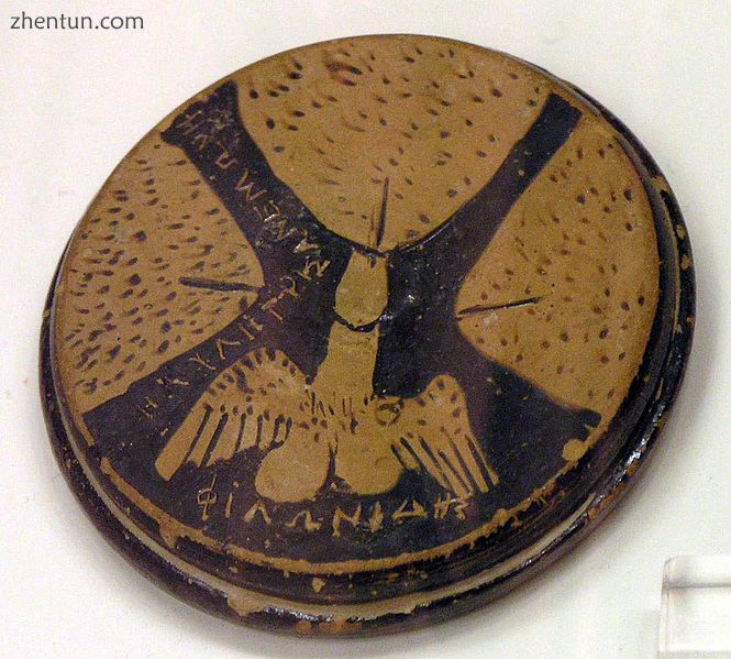 Attic red-figure lid. Three female organs and a winged phallus..jpg